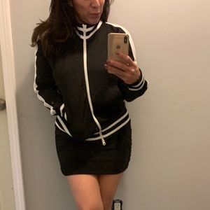 Black w/white stripe jacket with shoulder cutouts